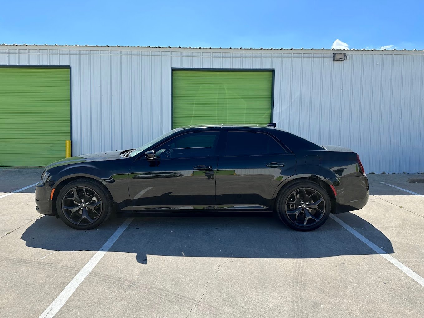Sedan Window Tinting at Kingdom Window Tint & PPF A freshly tinted charger sedan at Kingdom Window Tint & PPF in Fort Worth, showcasing high-quality window tint.