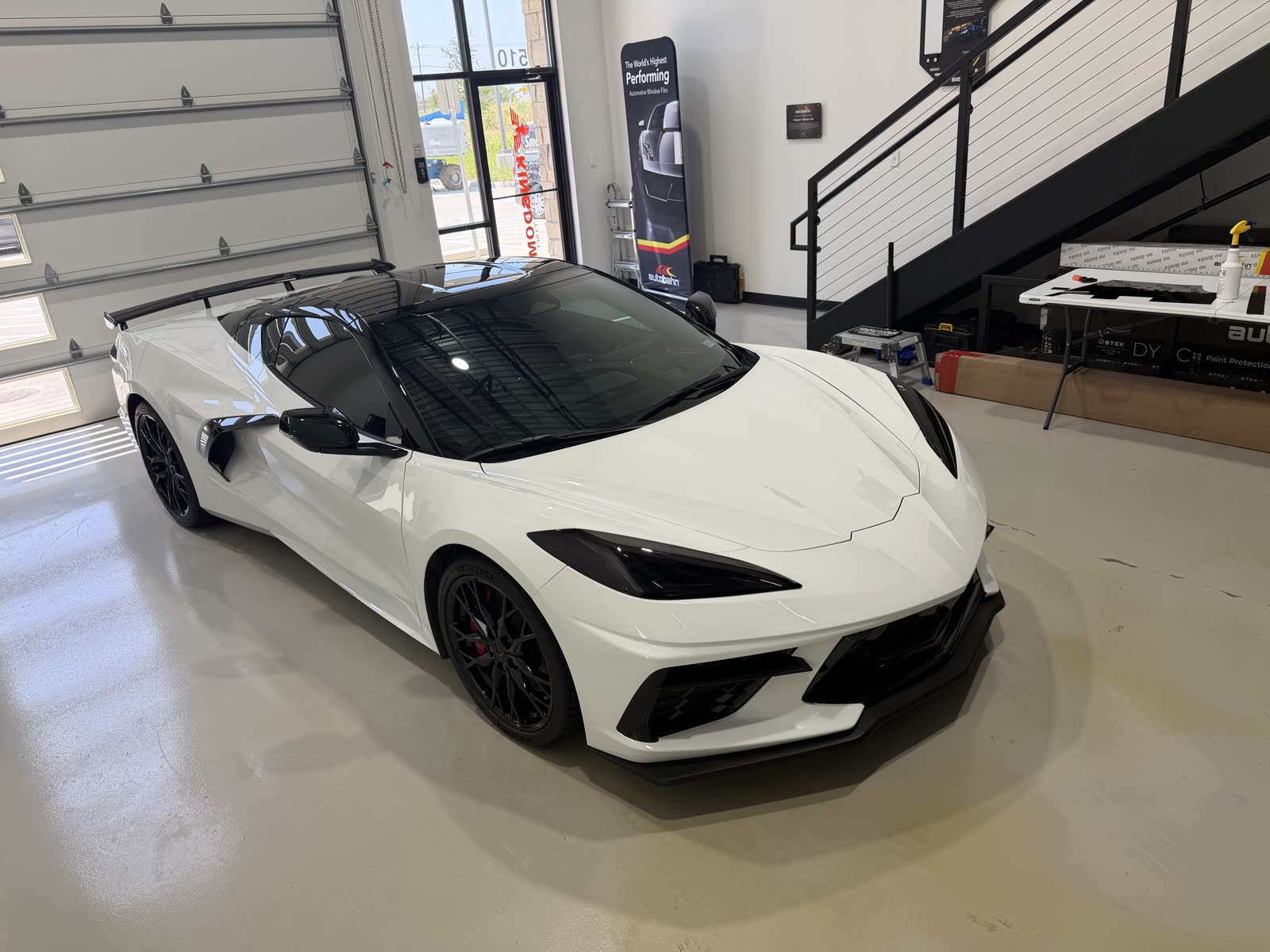 White C8 Corvette with PPF, ceramic coating and roof blackout at Kingdom Window Tint in Lewisville, TX
