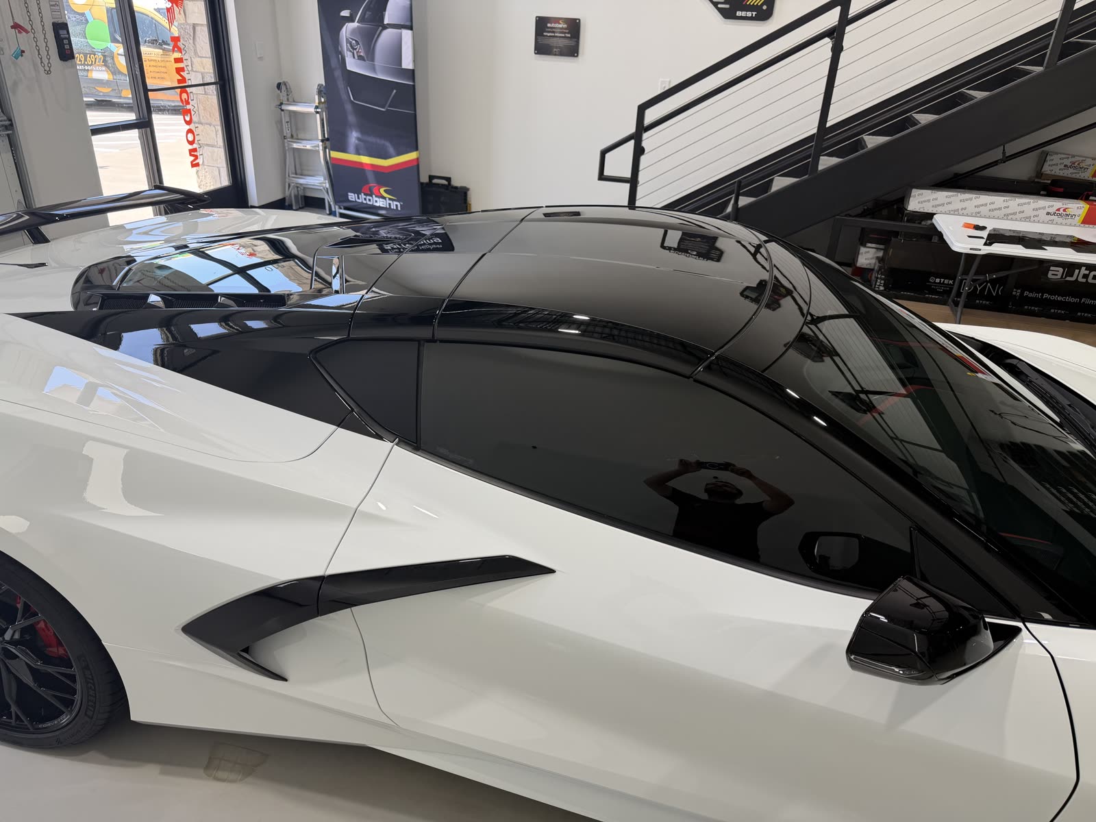 Autobahn Ceramic i3+ window tint and a tinted black roof on a white C8 Corvette