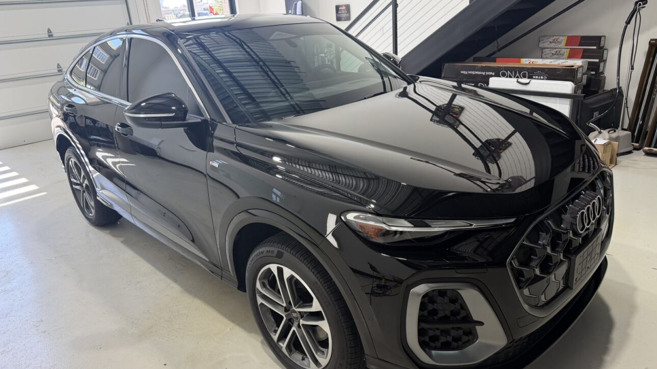 Black Audi Q5 Sportback after swirl mark removal and ceramic coating at Kingdom Window Tint in Lewisville, TX