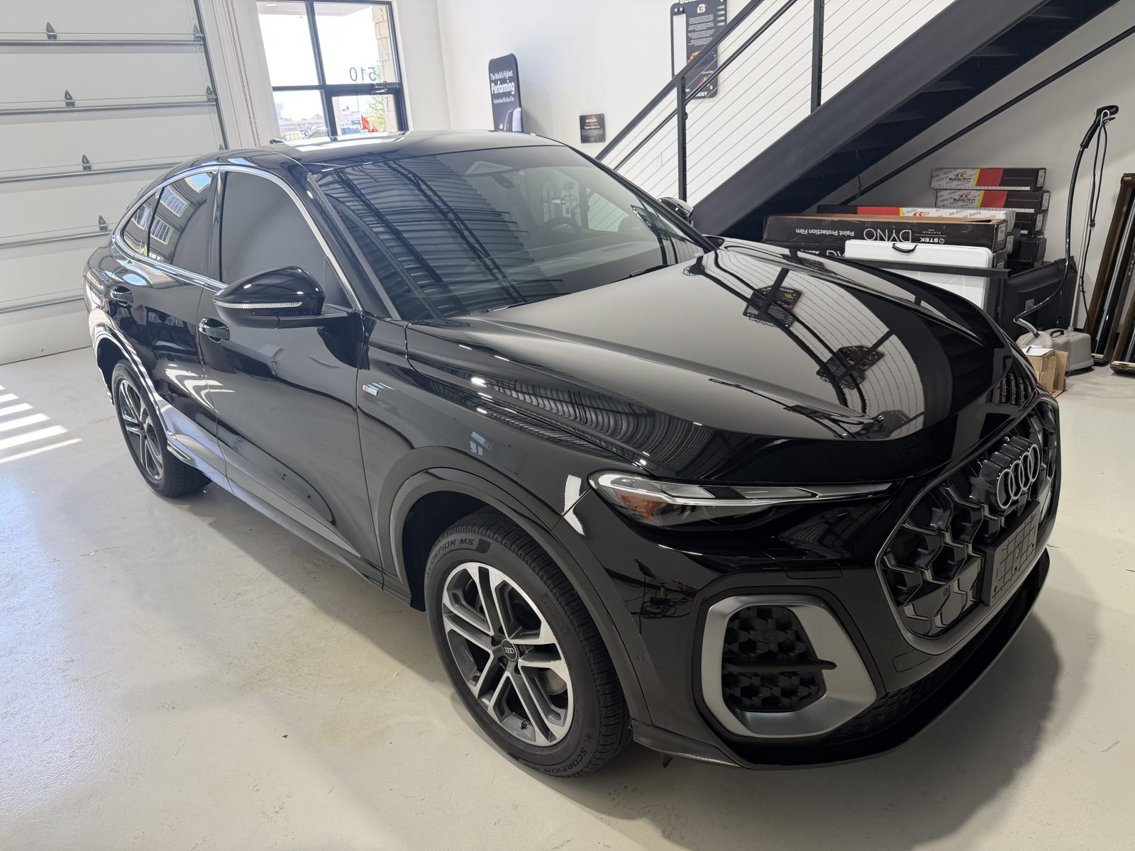 Black Audi Q5 Sportback after swirl mark removal and ceramic coating at Kingdom Window Tint in Lewisville, TX