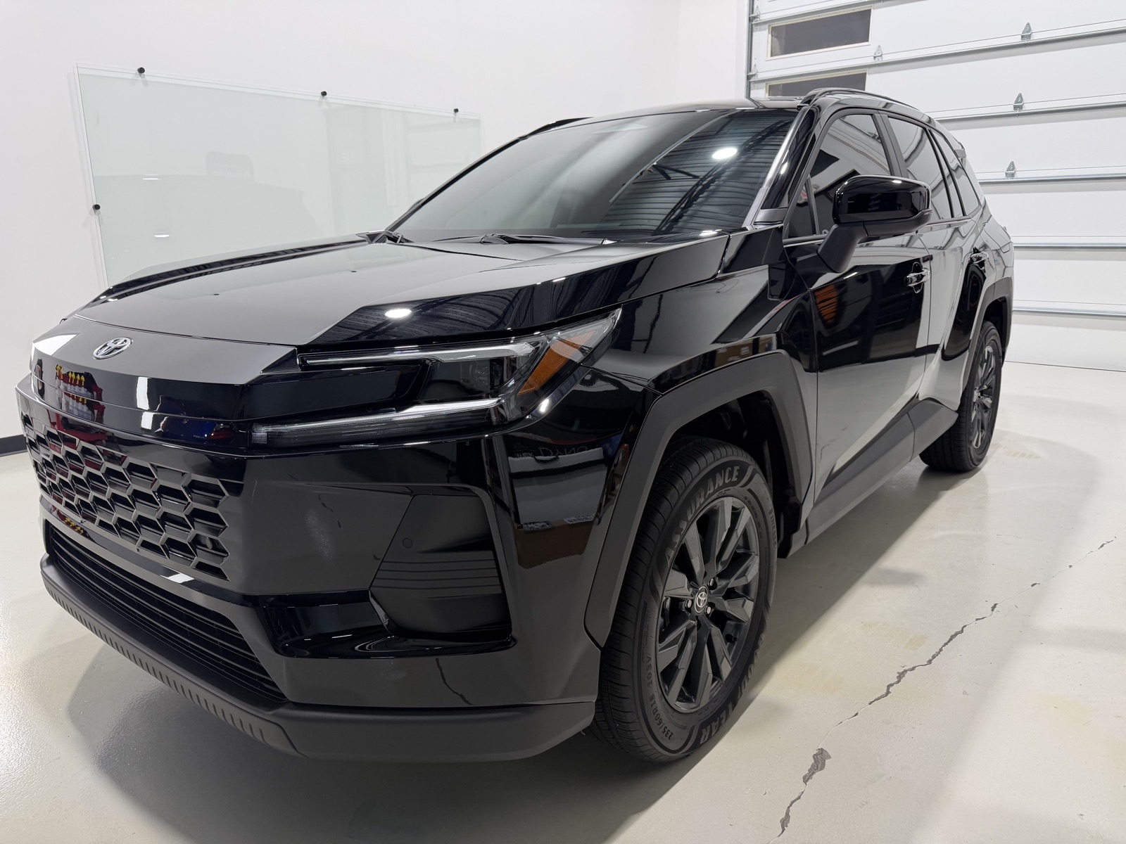 Black Toyota RAV4 XLE after ceramic coating at Kingdom Window Tint in Lewisville, TX