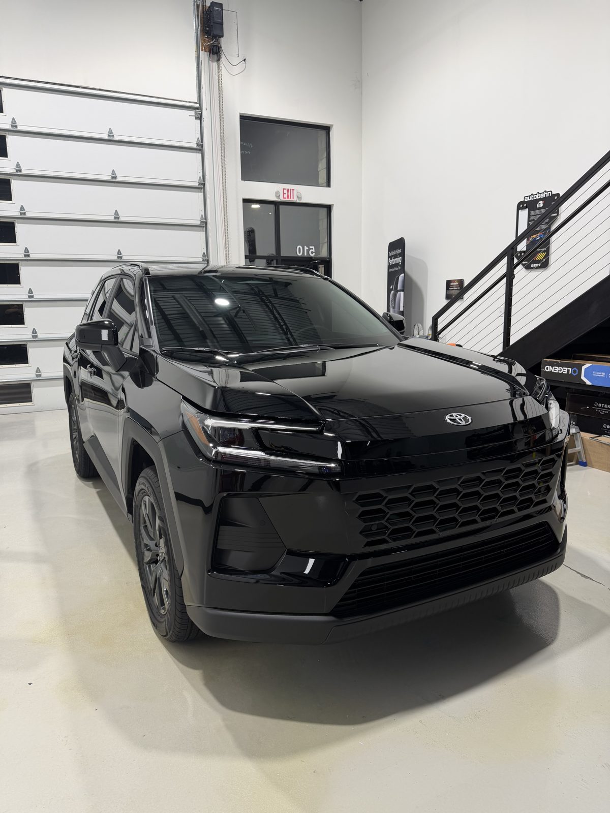 Front of a black Toyota RAV4 with full front PPF and ceramic coating