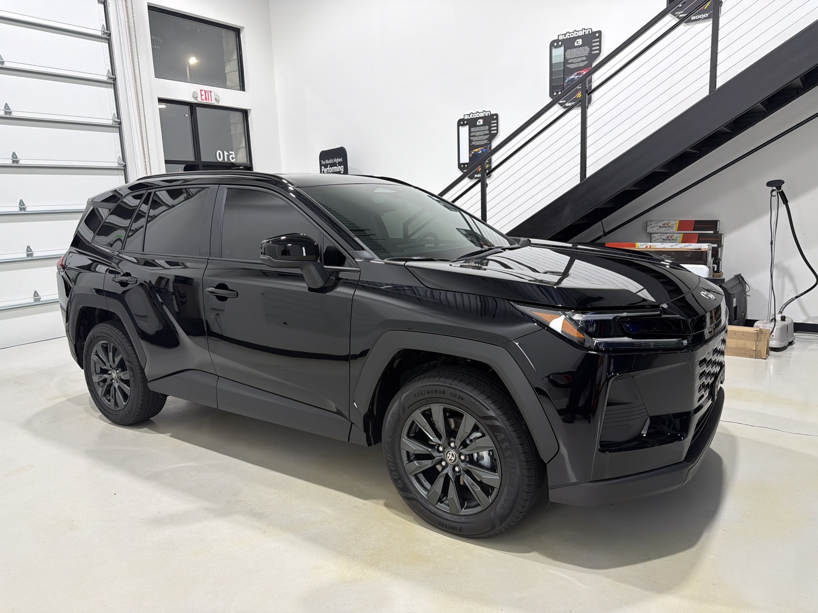 Front three-quarter view of a ceramic coated black Toyota RAV4 XLE